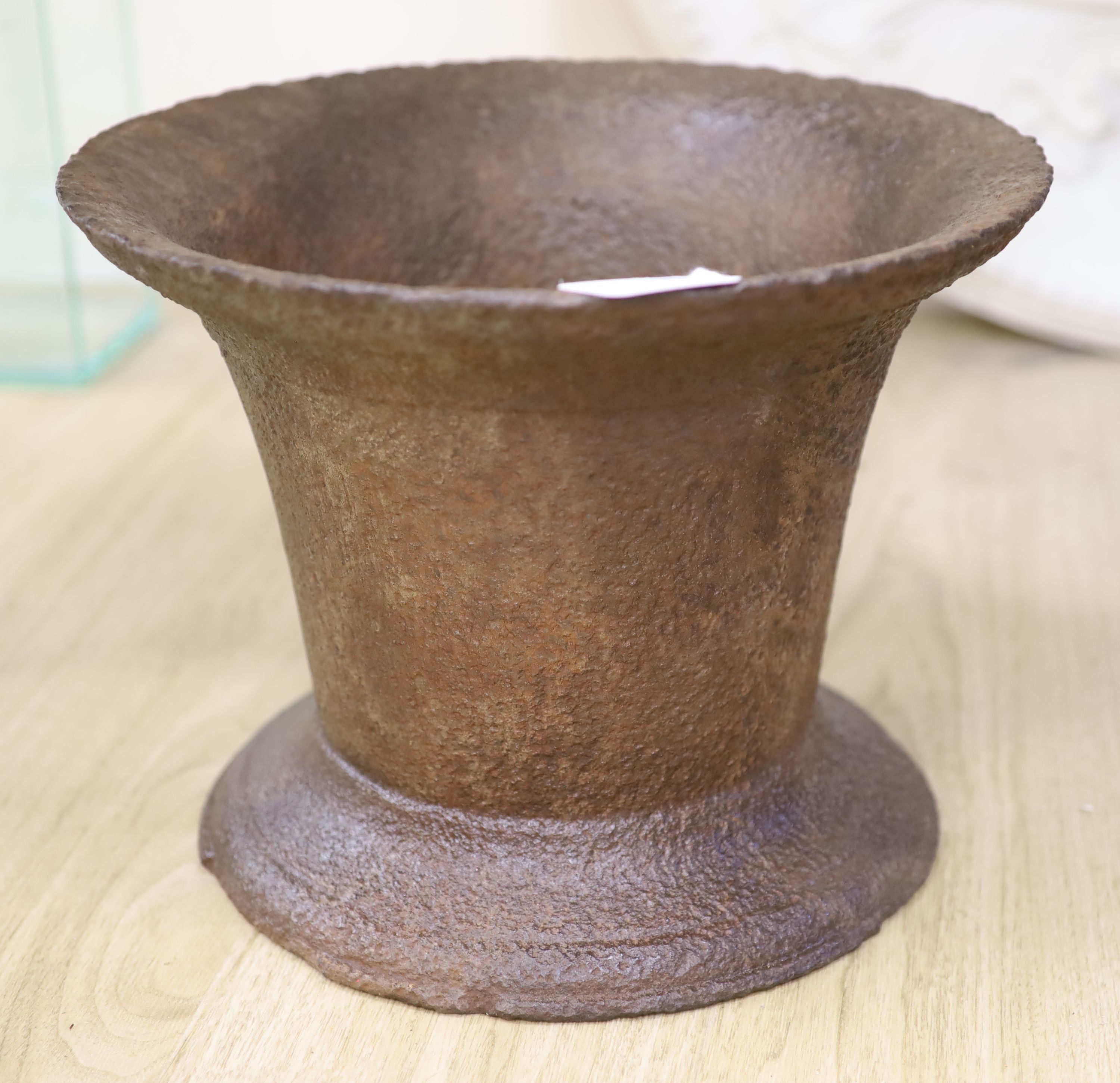 An early gun powder cast iron mortar, diameter 36cm